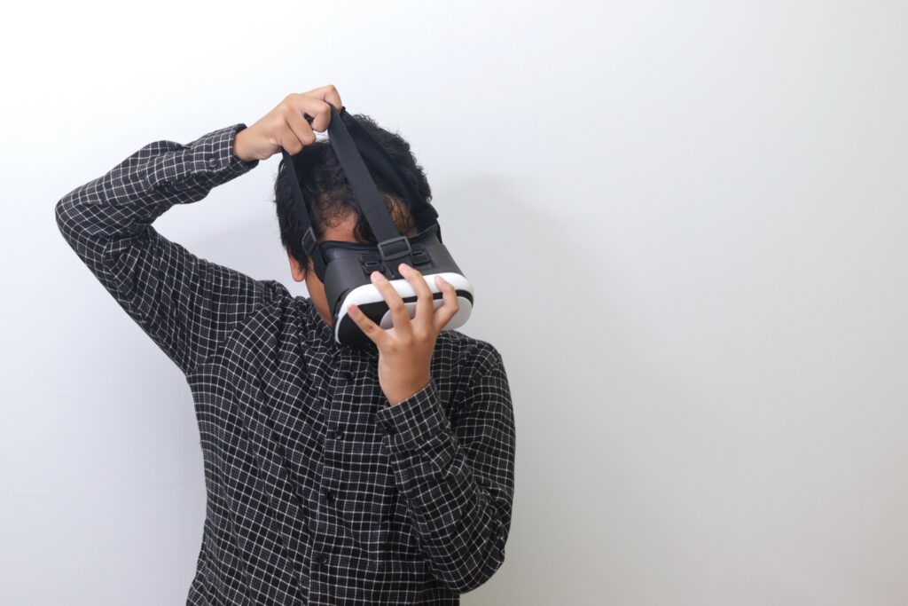 Person adjusting a VR headset for the first time