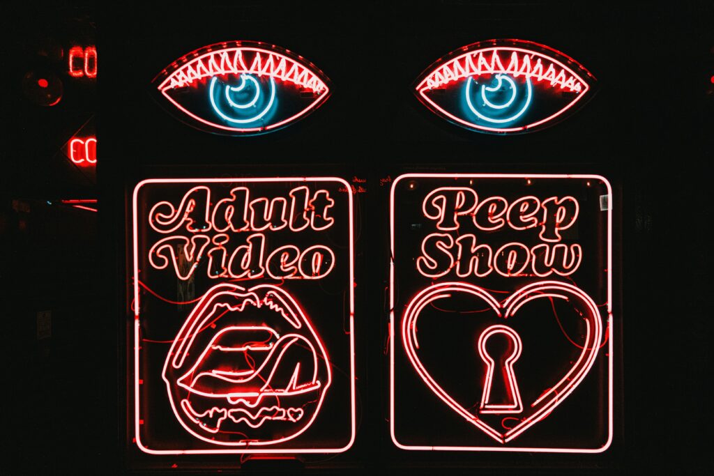 Neon adult video and peep show sign
