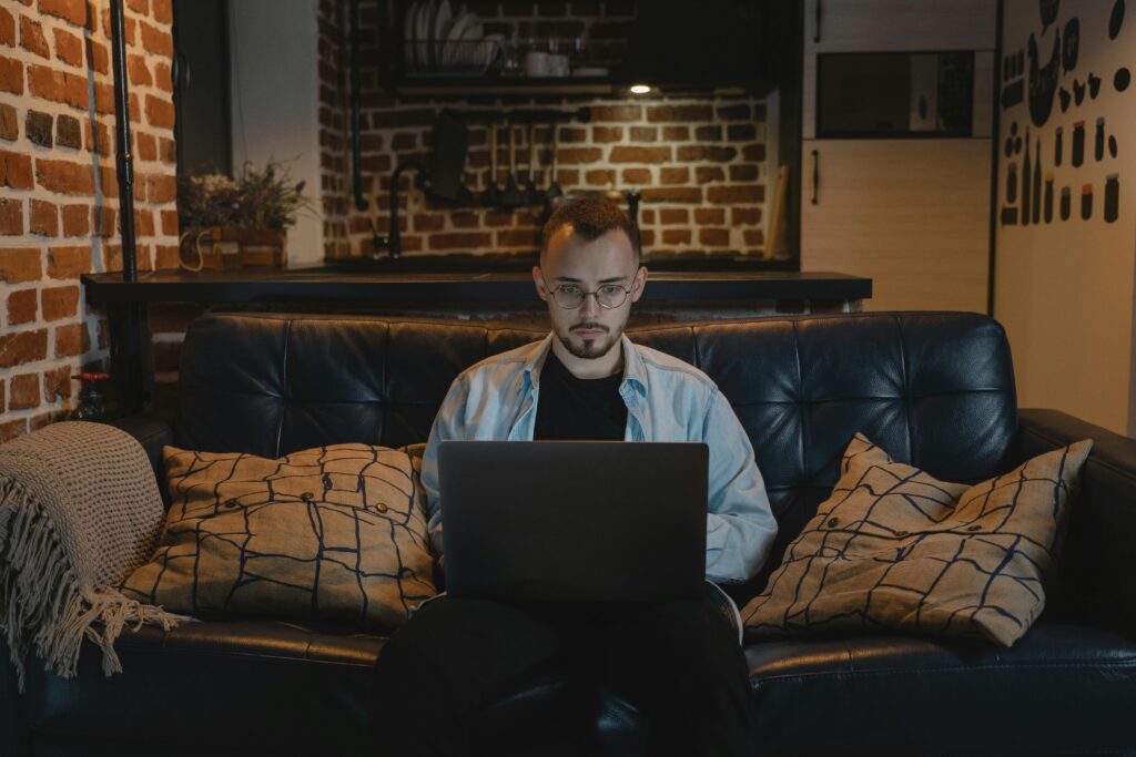 Man browsing adult websites at night