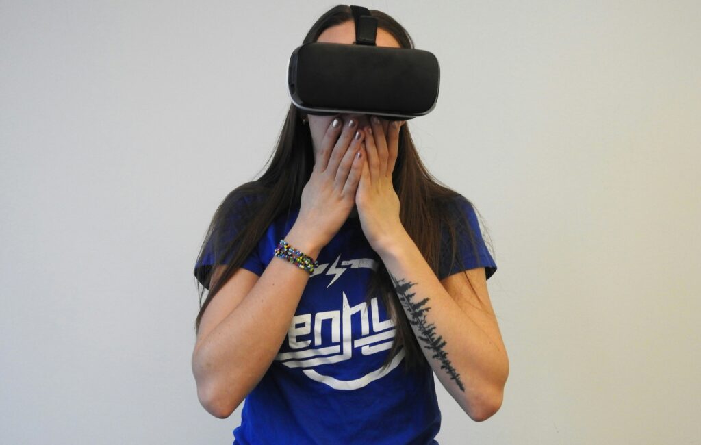 Woman reacting while using a VR headset