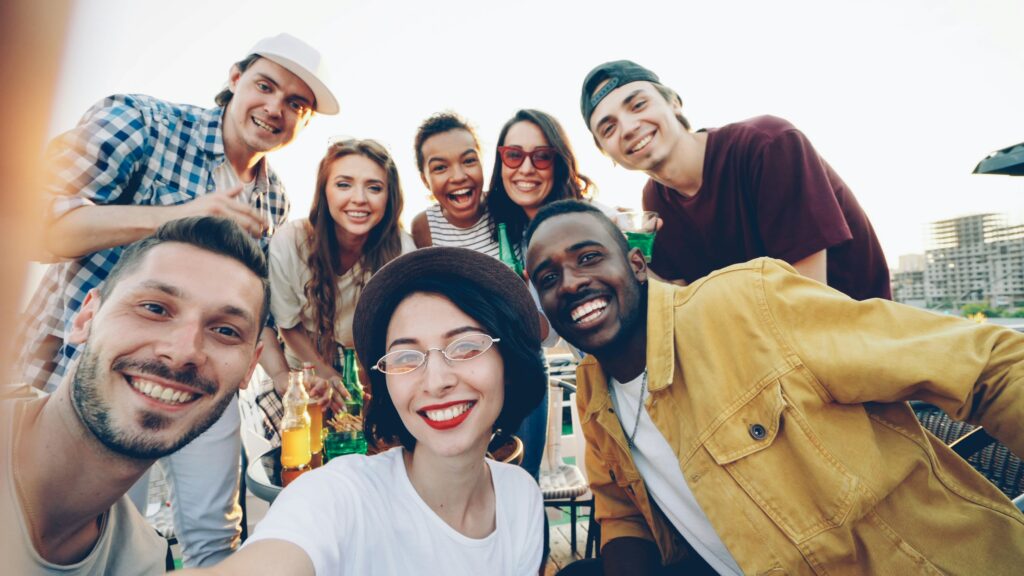 Group of friends smiling together outdoors
