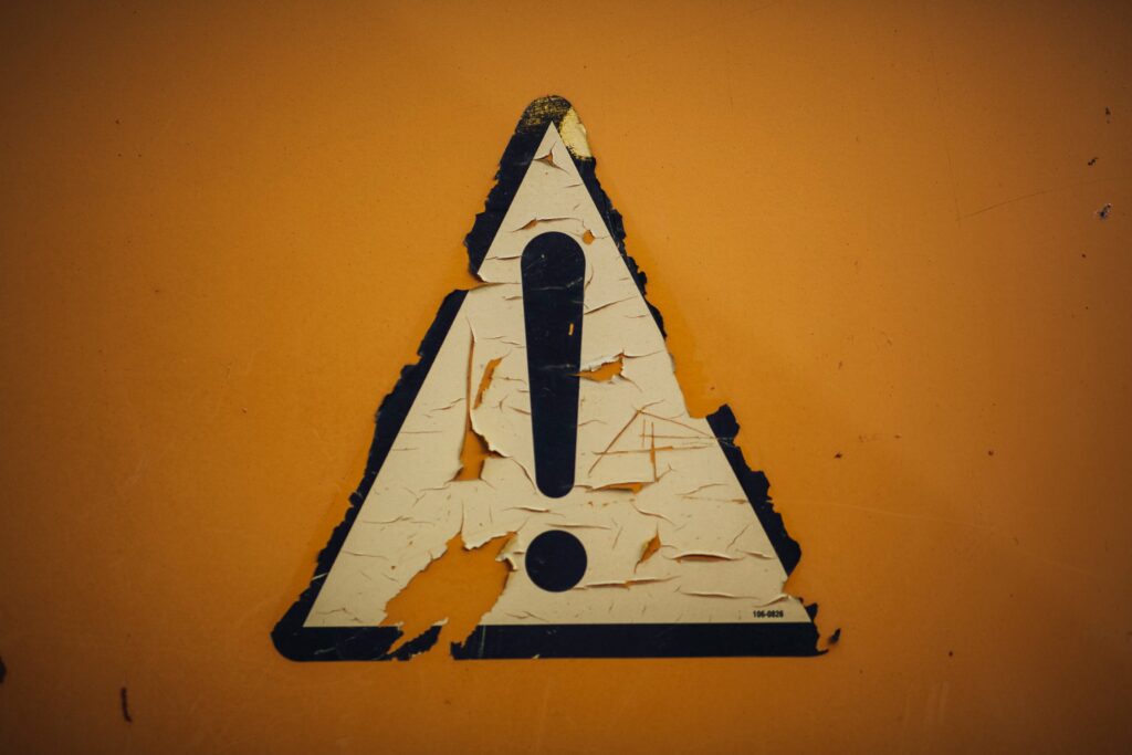 Warning symbol on an orange background